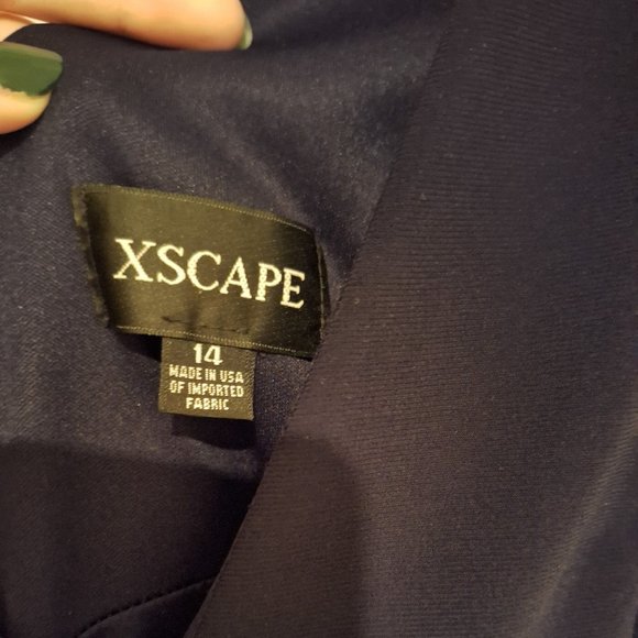 Navy Blue Tea Length Dress with Mesh Cut Outs and Floral Skirt - Picture 8 of 9